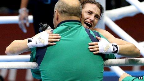 Katie Taylor hugs coach