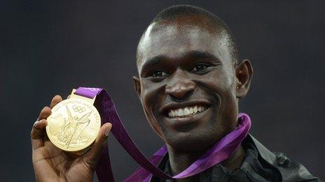 David Rudisha shows off his gold medal