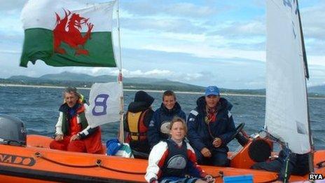 A younger Hannah Mills learning her sailing skills