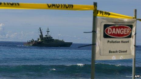 An Australian navy vessel sails past Christmas Island on 29 February 2012