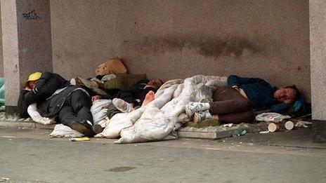 A group sleeping rough outside