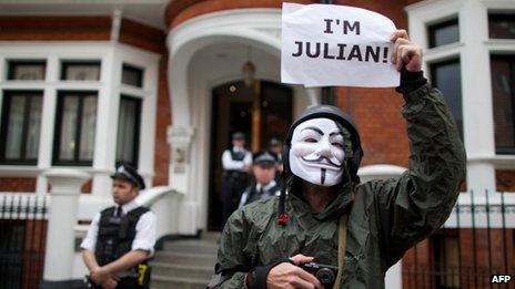 A supporter of Julian Assange, outside the Ecuadorean Embassy in London