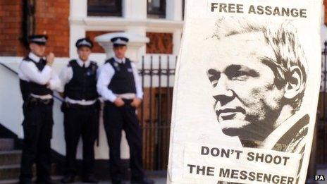 Police outside the Ecuadorian embassy in London