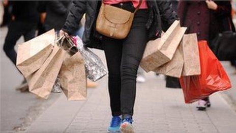 Woman carrying shopping bags