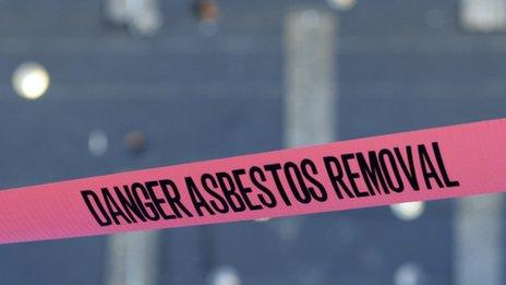 Asbestos removal sign