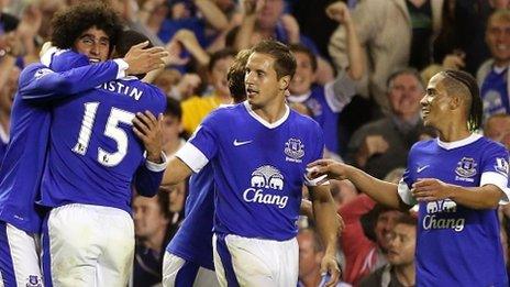 Everton celebrate Marouane Fellaini's winner