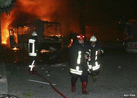 Firefighters tackle a blaze after the bomb blast in Gaziantep, Turkey, 21 August