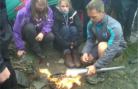 Scouts ignited the flame on the top of Snowdon which was then used to light the torch