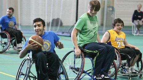 Young people take part in wheelchair basketball