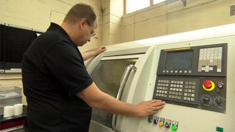 Man operating a machine