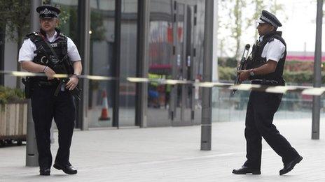 Met Police at the entrance to the Olympic Park during the Games