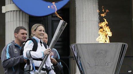 Claire Lomas lights the cauldron in Trafalgar Square