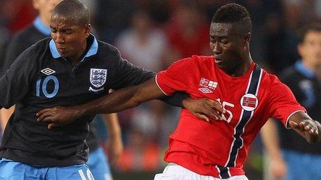 Alexander Tettey with Ashley Young