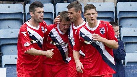 Ross County celebrate Richard Brittain's (second from left) penalty winner