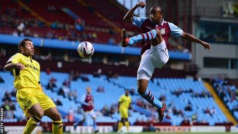 Aston Villa's Fabian Delph [r]