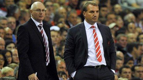 Hearts boss John McGlynn (left) looks on beside Liverpool counterpart Brendan Rodgers