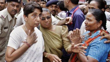 Maya Kodnani, left, at a special court in Ahmedabad on 31 August, 2012