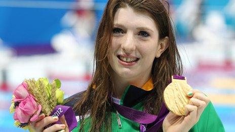 Bethany Firth celebrates with her gold medal