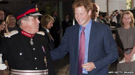 Prince Harry is met by Lord Lieutenant for Greater London David Brewer as he arrives at the WellChild awards ceremony in London on 3 September