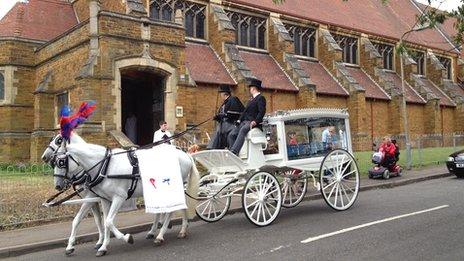 A horse drawn carriage at Dylan Cecil's funeral