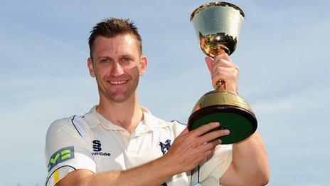 Warwickshire captain Jim Troughton with the County Championship trophy