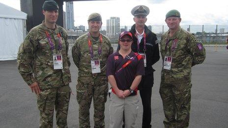 Sam Haslam and military personnel