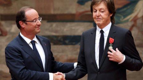 French President Francois Hollande presents Sir Paul McCartney with the Legion of Honour at the Elysee Palace, 8 September