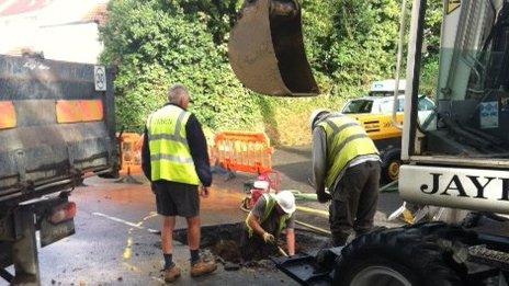 Working on the burst water main on Patier Road