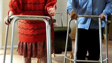 elderly people with walking frames