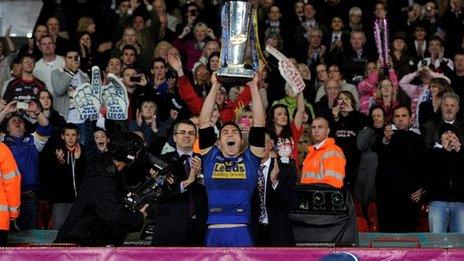 Keinv Sinfield with the Super League trophy