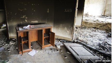 Damage inside the burnt US consulate building in Benghazi following an attack on the building late on September 11 in which the US ambassador to Libya and three other US nationals were killed