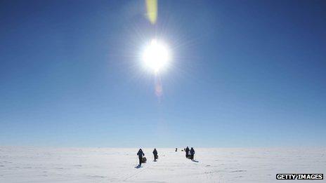 Explorers on skis in Antarctica