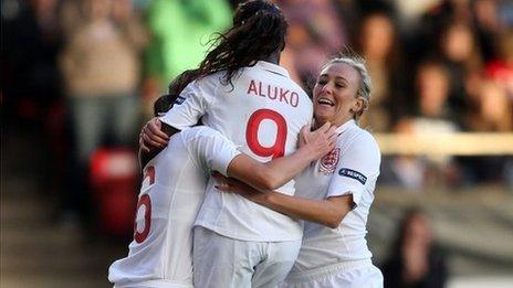 Casey Stoney of England celebrates scoring the third goal