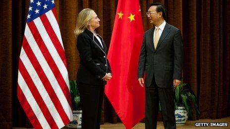 US Secretary of State Hillary Clinton (L) is greeted by Chinese Foreign Minister Yang Jieche at the Ministry of Foreign Affairs in Beijing