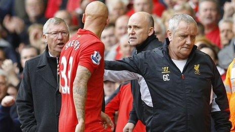 Sir Alex Ferguson (left) Jonjo Shelvey exchange words as the Liverpool player walks off after being red-carded