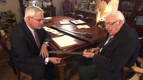 Ian Paisey shows our political reporter the sword belonging to Fred Crawford who organised the gun running