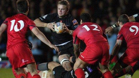 Dragons' Lewis Evans charges forward against Edinburgh