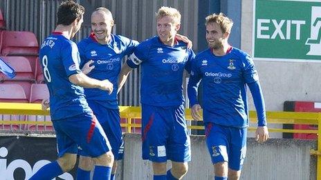 Richie Foran (second from right) celebrates with teammates after scoring his second goal for Inverness