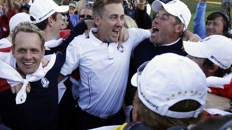 Victorious European players Luke Donald, Ian Poulter and Lee Westwood celebrating