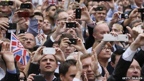 Crowd holding smart phones