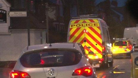 A police van after the raid