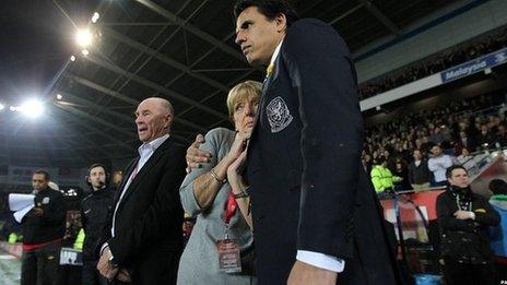 Gary Speed's father Roger and mother Carol with Wales manager Chris Coleman (right) during the International Friendly at Cardiff City Stadium, Cardiff in February. Pic: David Davies/PA Wire