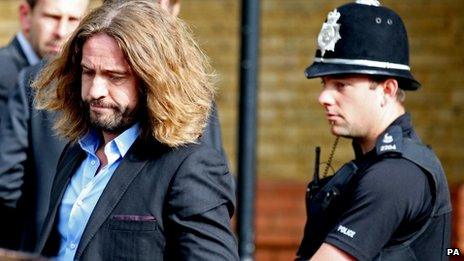 Justin Lee Collins leaves St Albans Crown Court after being found guilty of harassment
