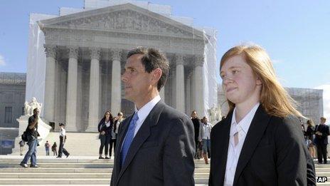 Abigail Fisher and Edward Blum walk in front of the US Supreme Court in Washington DC, 10 October 2012