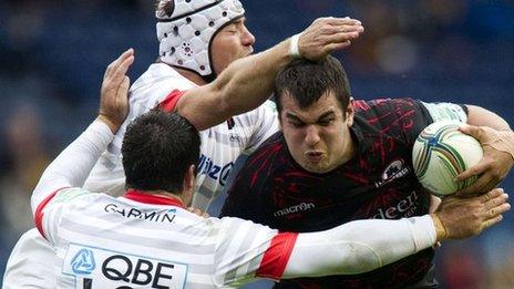 Stuart McInally (right) is closed down by Saracens' Schalk Brits and Brad Barritt