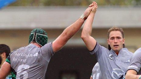 Dan Parks congratulates John Muldoon after the flanker's try in Parma