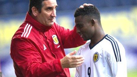 Sbragia congratulates Feruz after his hat-trick against Switzerland