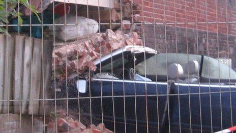 Car embedded in house, Norfolk