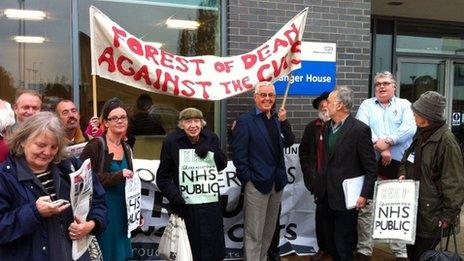 Campaigners gathered outside Gloucestershire NHS headquarters