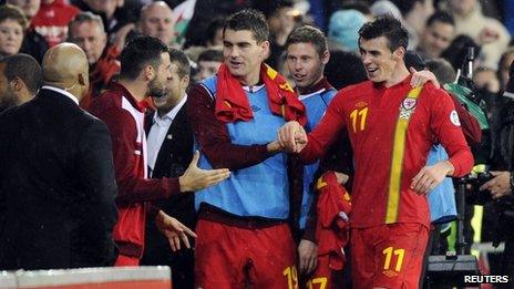 Gareth Bale receives congratulations from fans after Friday's match